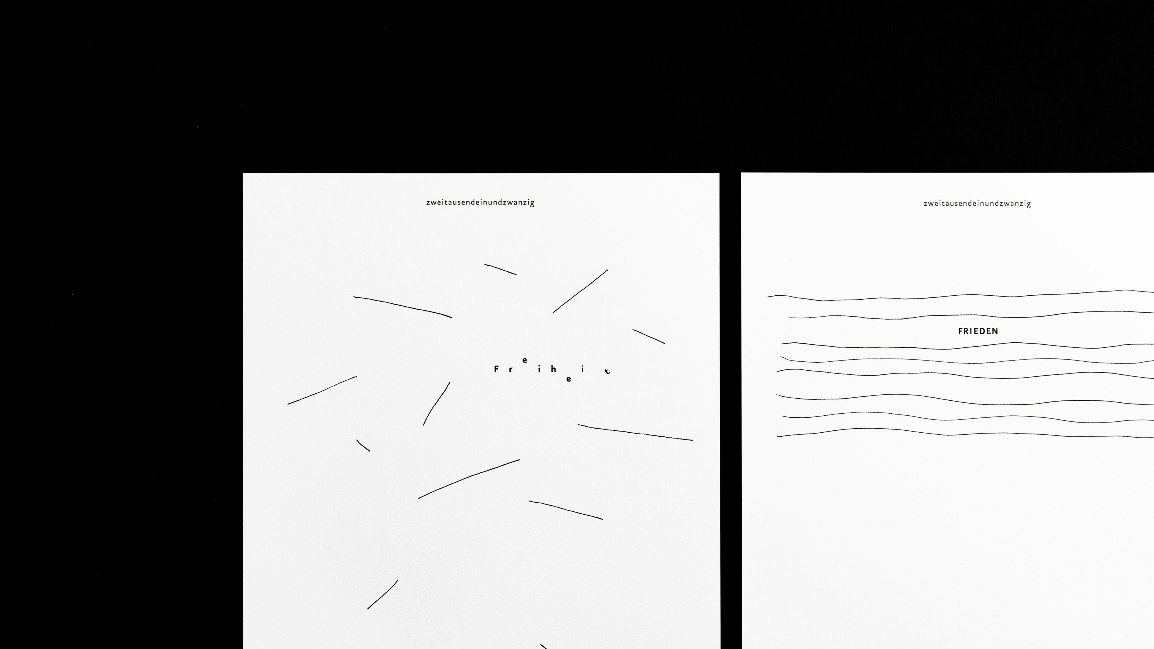 VISUELL Blogbeitrag: Wort und Form VISUELL Blogbeitrag: VISUELL-Kalender 2021: Zwei Monatsseiten mit Linien– Aufschrift: Freiheit und Frieden