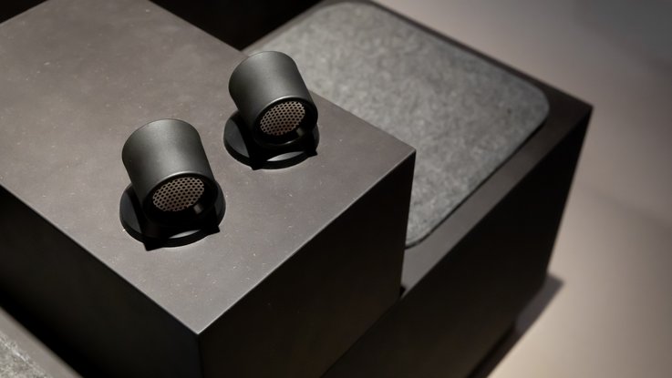 VISUELL Scenography: Permanent exhibition at Hornmoldhaus: Detail of a black display unit with two integrated loudspeakers and upholstered seat as part of the accessible listening station.