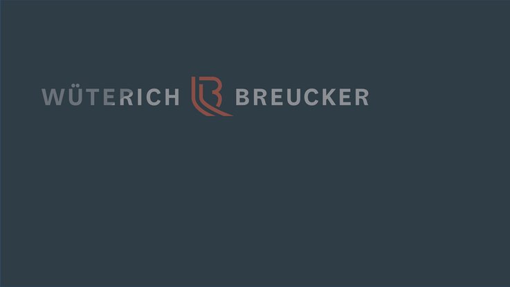 VISUELL Kommunikationsdesign: Corporate Design: Die Wort-Bild-Marke in Silber und Bronte auf dunkelblauem Grund